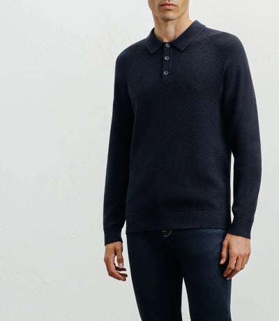 Navy polo-neck sweater with buttons and stitches