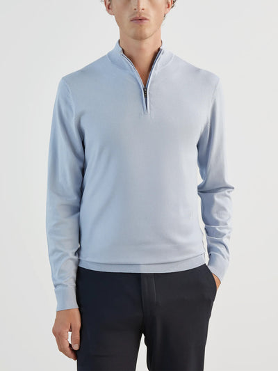 Light blue zip-neck jumper