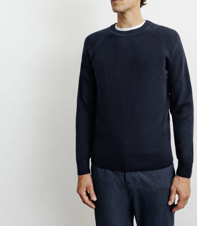 Round-neck sweater with navy stitch pattern