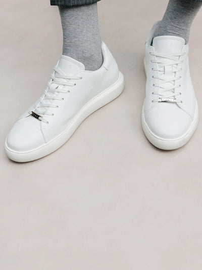White leather sneakers shoes