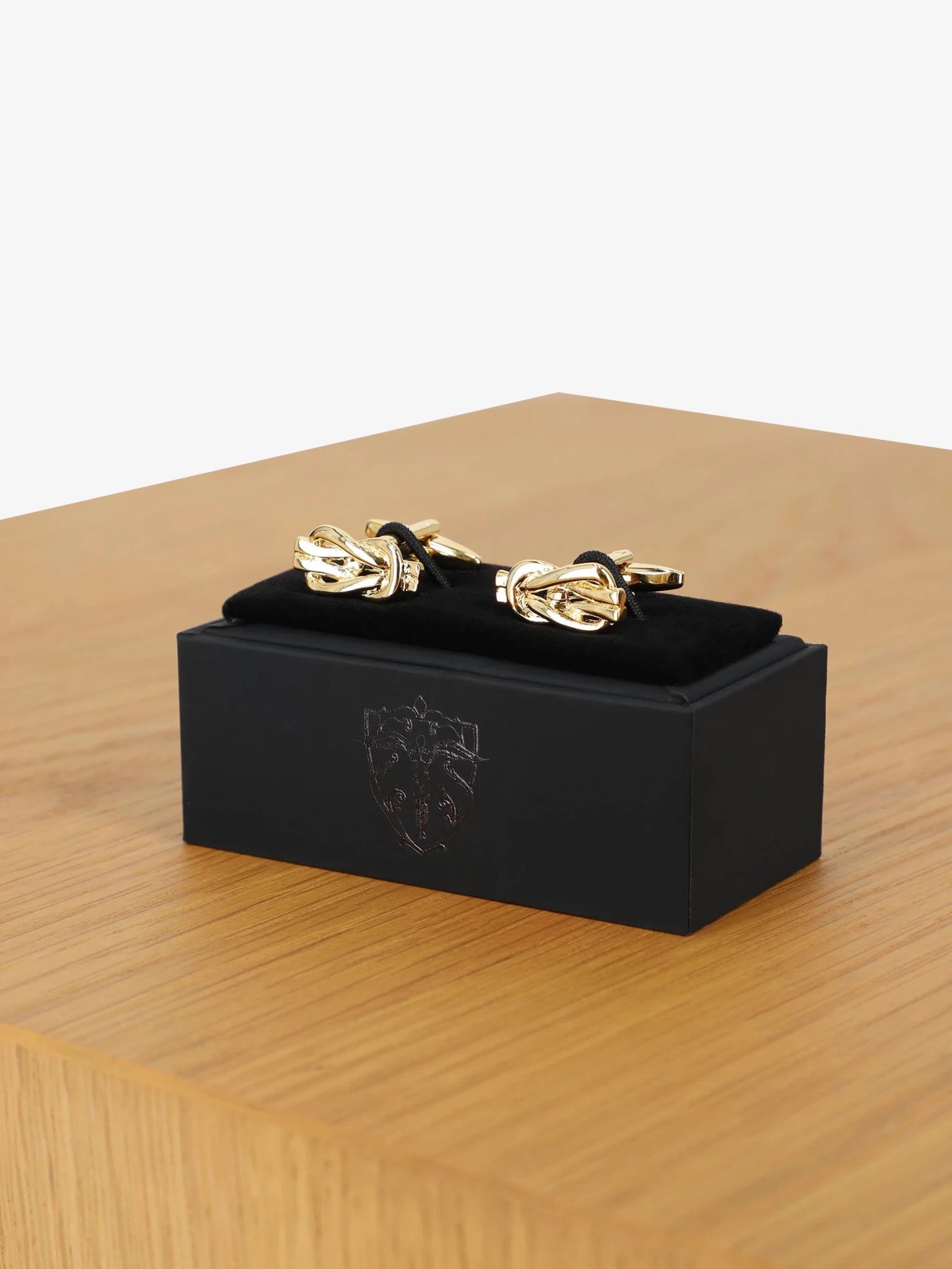 Boutons de manchette or