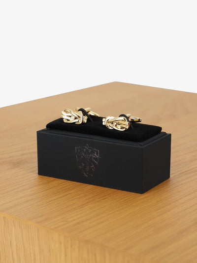 Boutons de manchette or