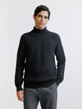 Pull col roulé en maille côtelée noir