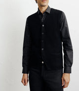 Sleeveless vest, buttoned, black dot pattern