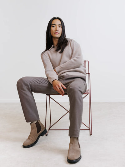 Beige open polo collar jumper with textured stitching