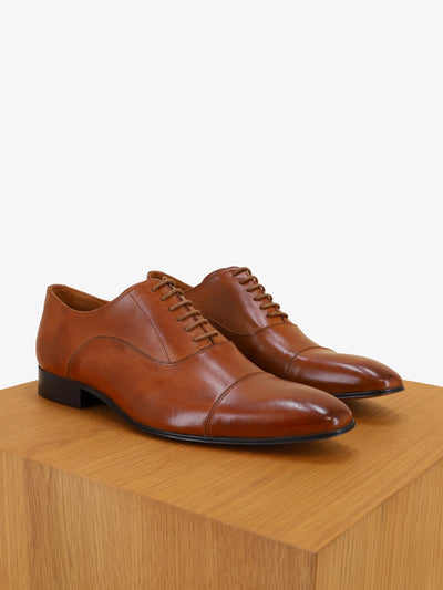 Brown leather richelieu shoes