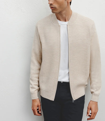 Beige vest with zipper and dot pattern