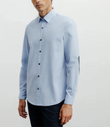 Chemise casual bleue avec des coudières en suède marine