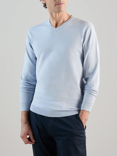 Light blue V-neck sweater
