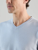 Light blue V-neck sweater