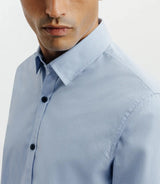 Chemise casual bleue avec des coudières en suède marine