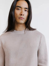 Pull col rond à jeux de points beige