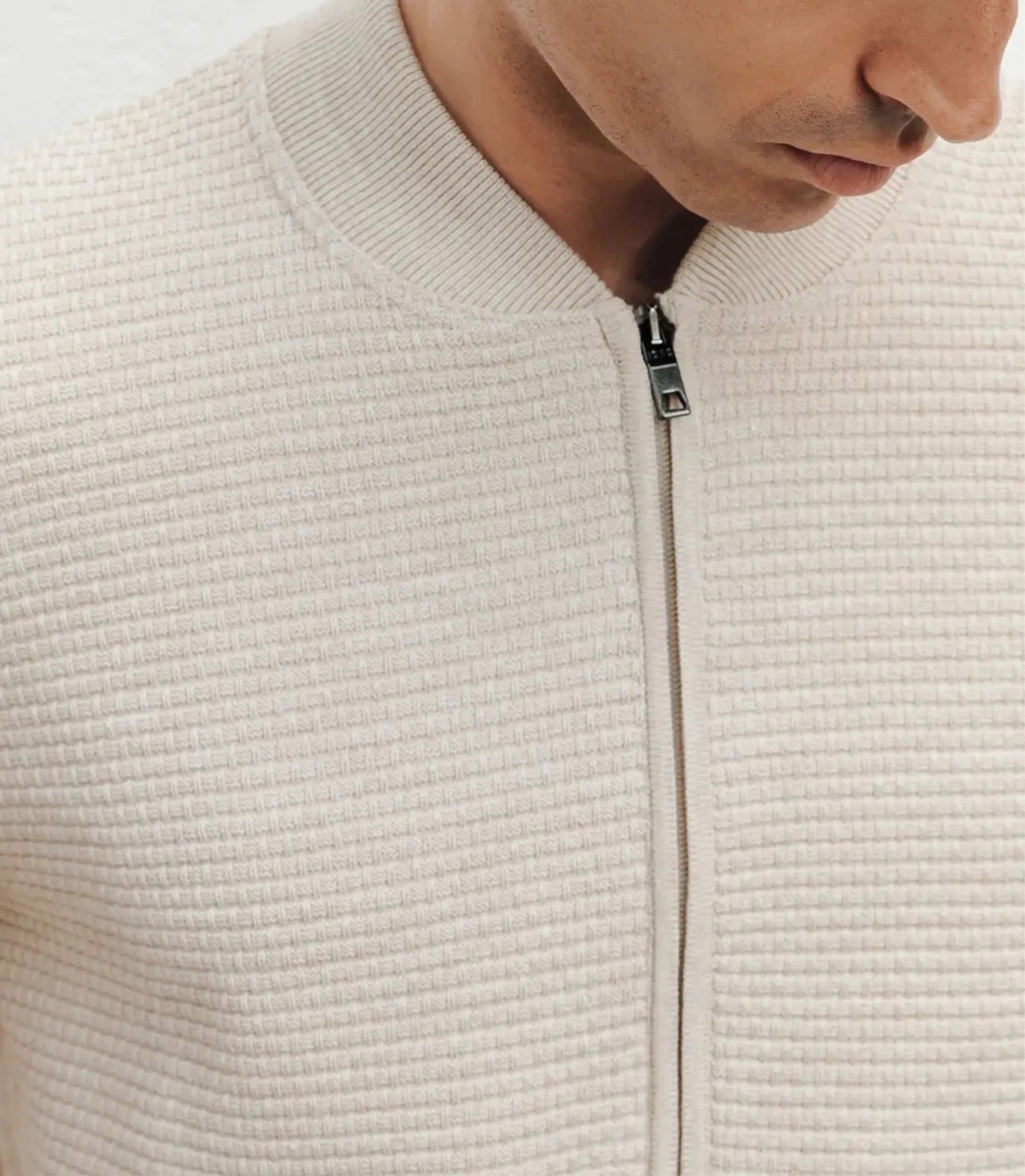 Beige vest with zipper and dot pattern