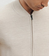 Beige vest with zipper and dot pattern