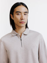 beige zip-up polo shirt
