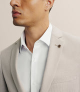 Costume with beige pockets