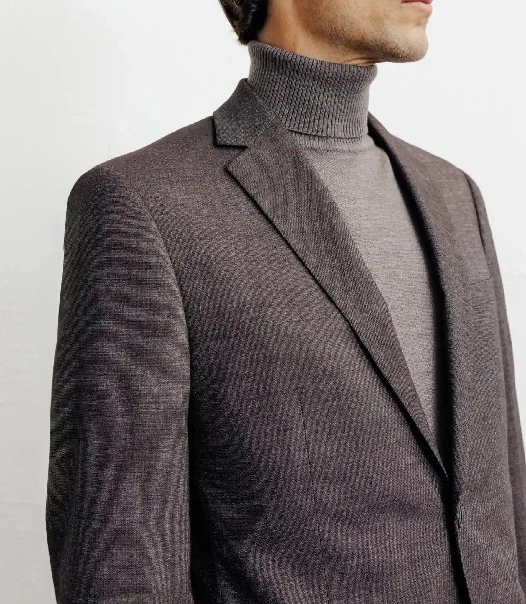 Costume with brown buttons