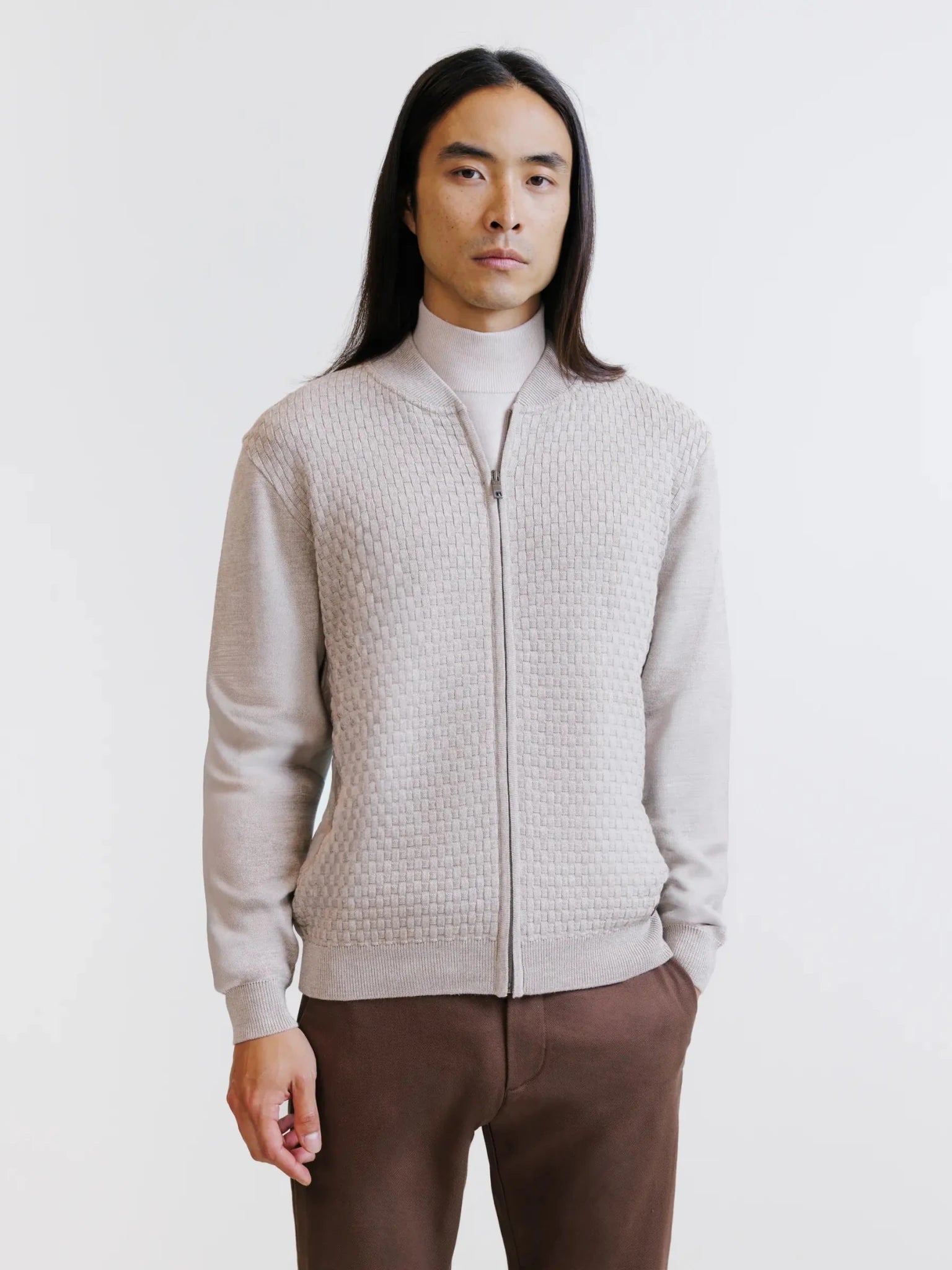 Beige zipped cardigan with textured knit