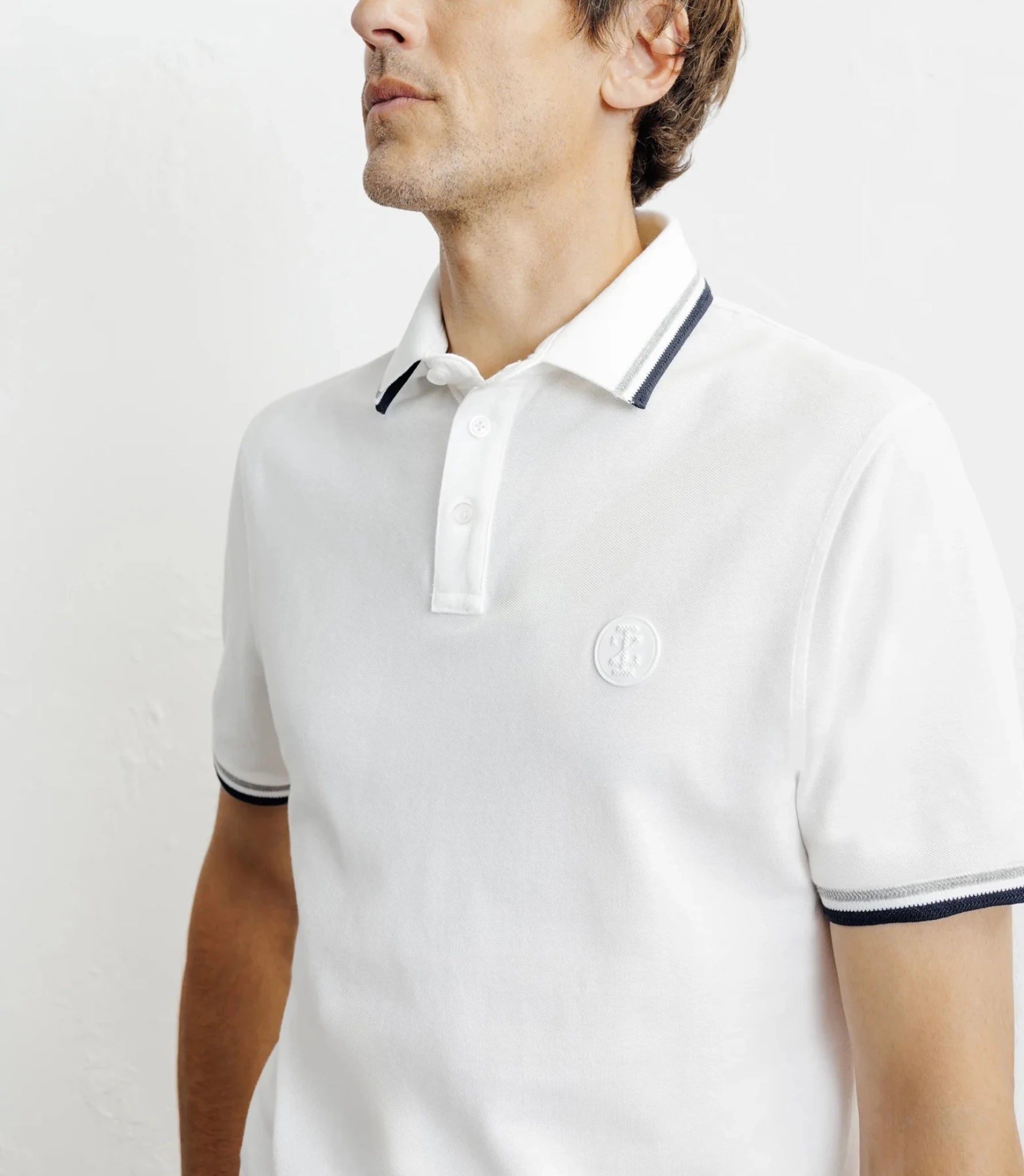 White button-down polo shirt