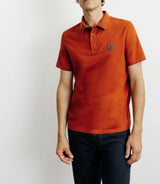 Polo boutonné rouge clair