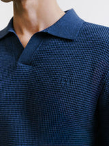 Open polo-neck jumper with indigo stitch patterns
