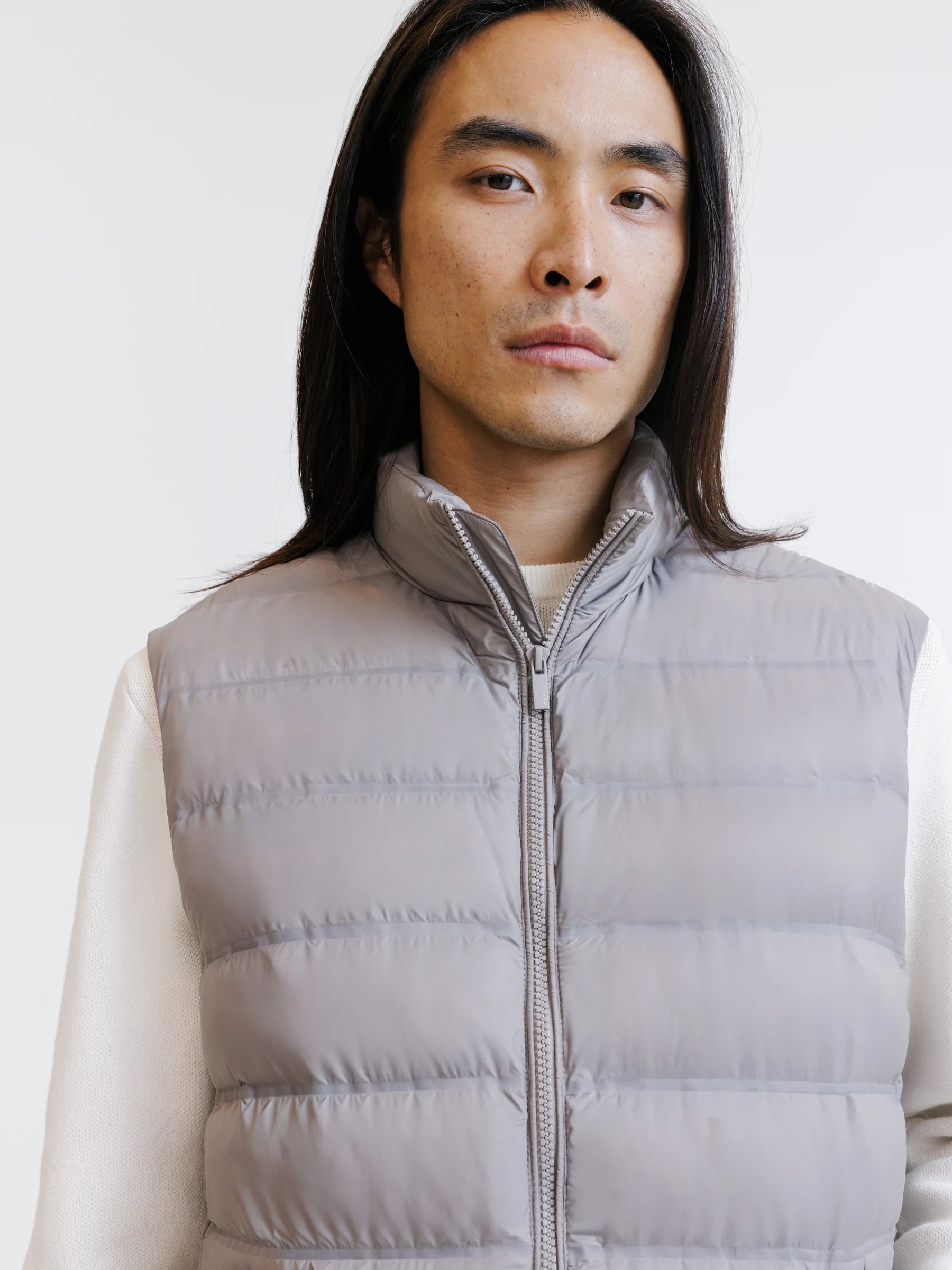 Taupe sleeveless puffer jacket