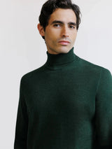 Dark green merino wool turtleneck sweater