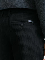 Black velvet trousers