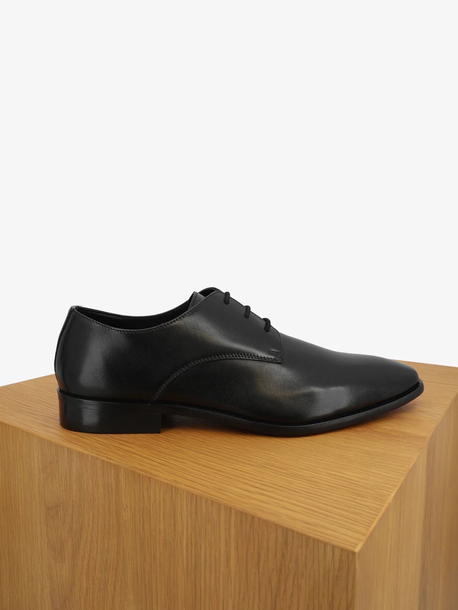Black leather derby