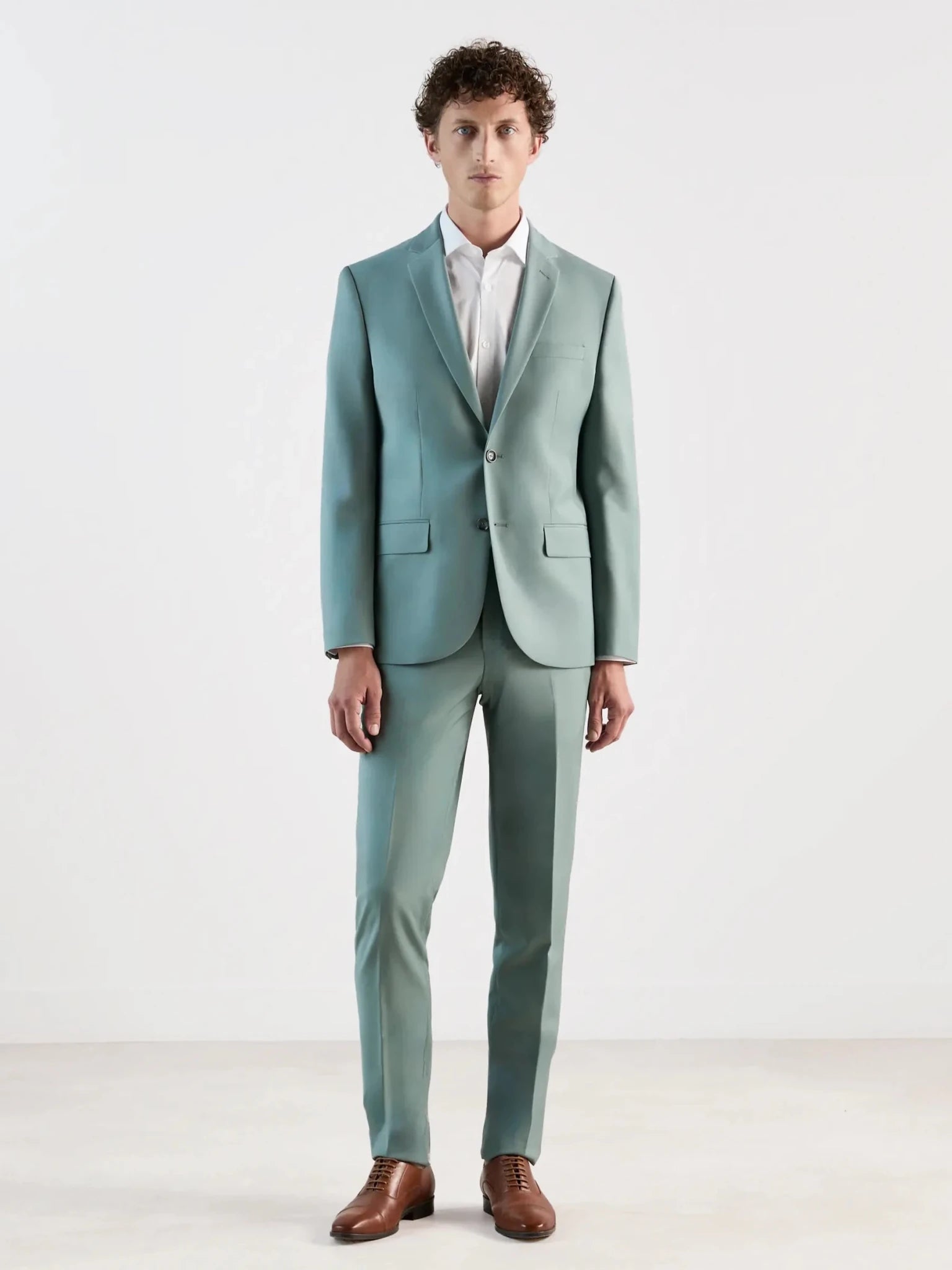 Light green, predominantly wool, two-button suit