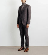 Costume with brown buttons