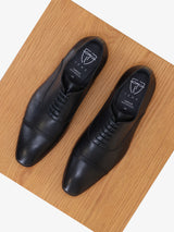 Black leather richelieu shoes