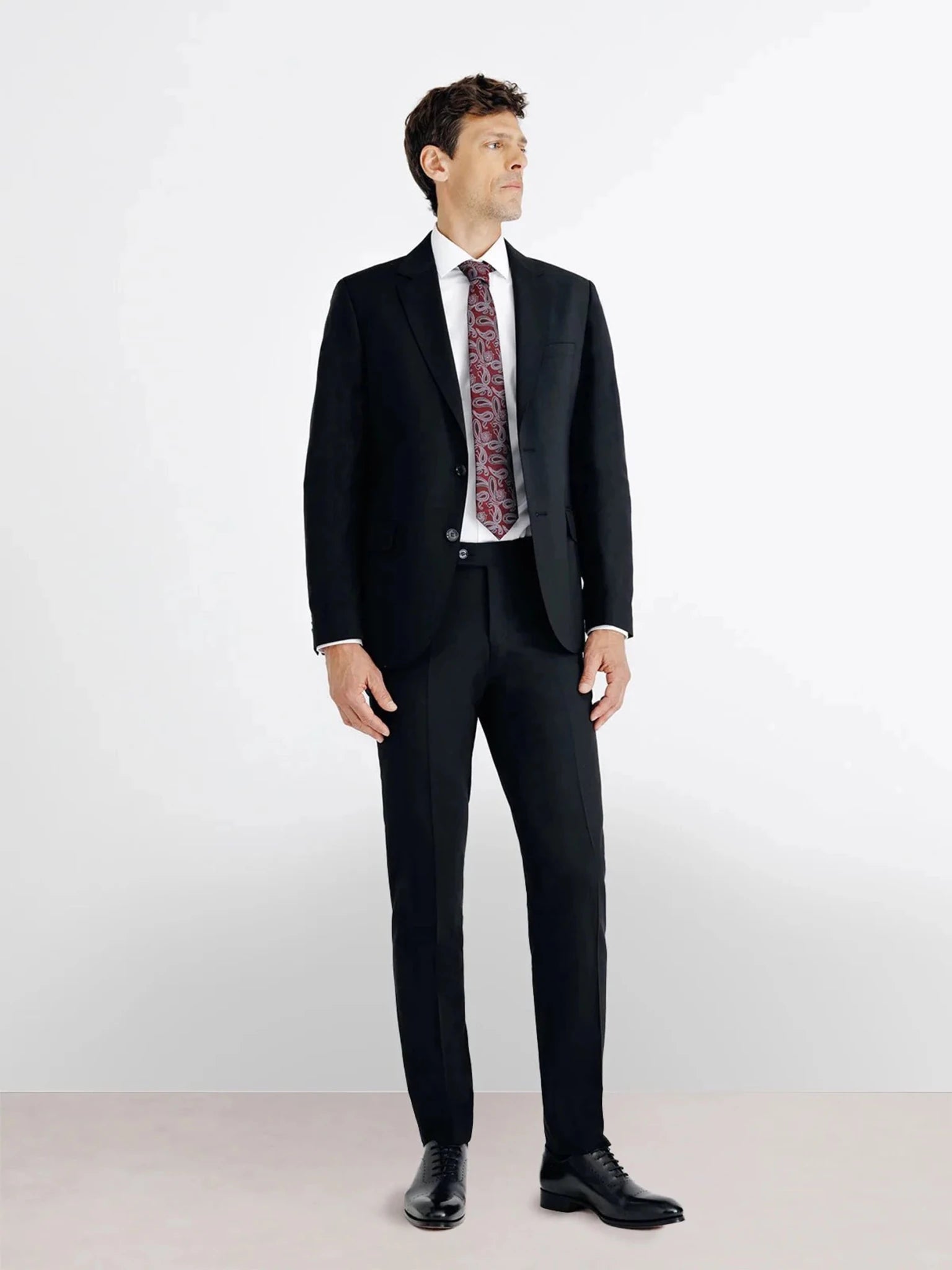 2 black wool buttons suit