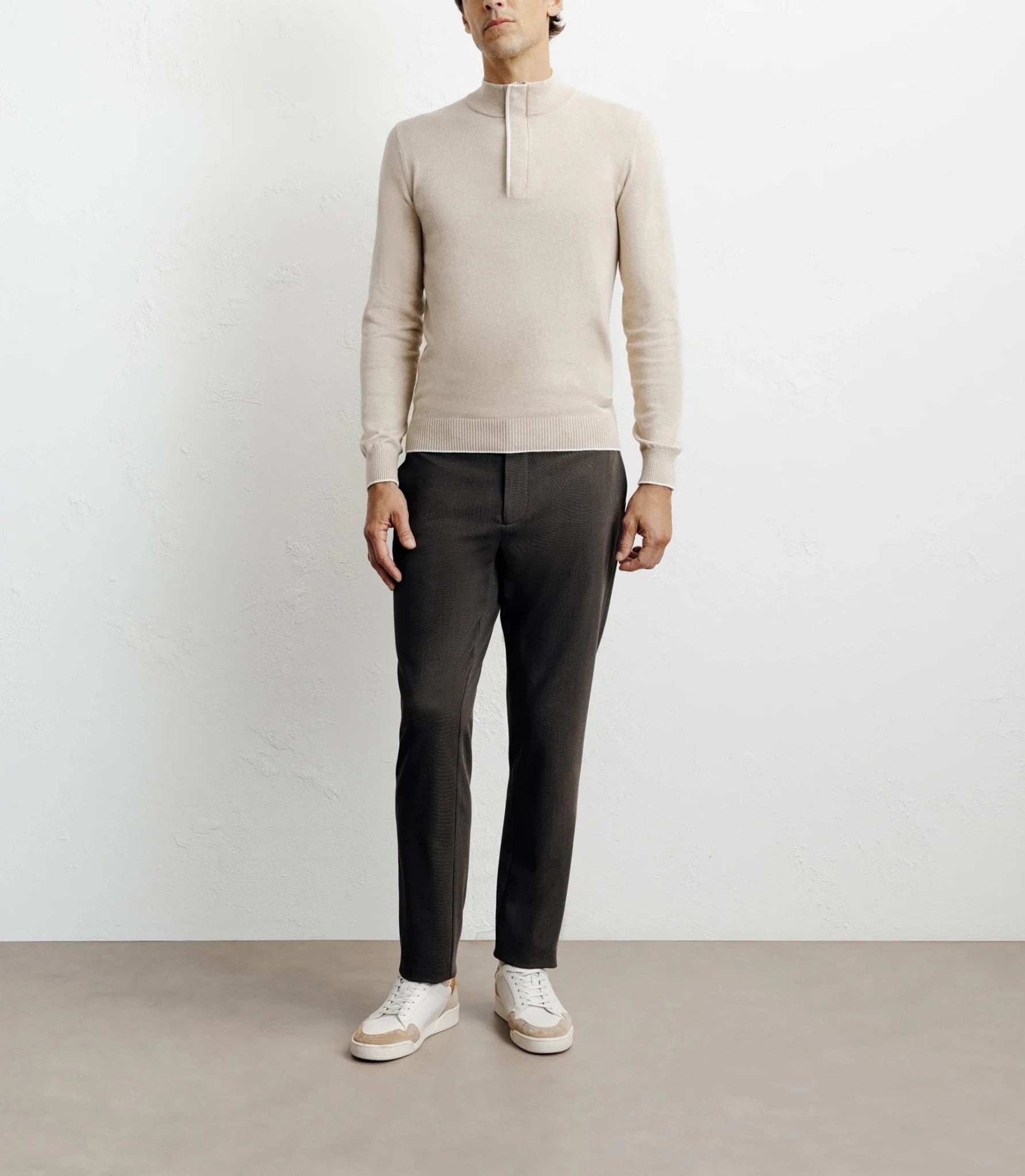 Beige half-zipped stand-up collar sweater