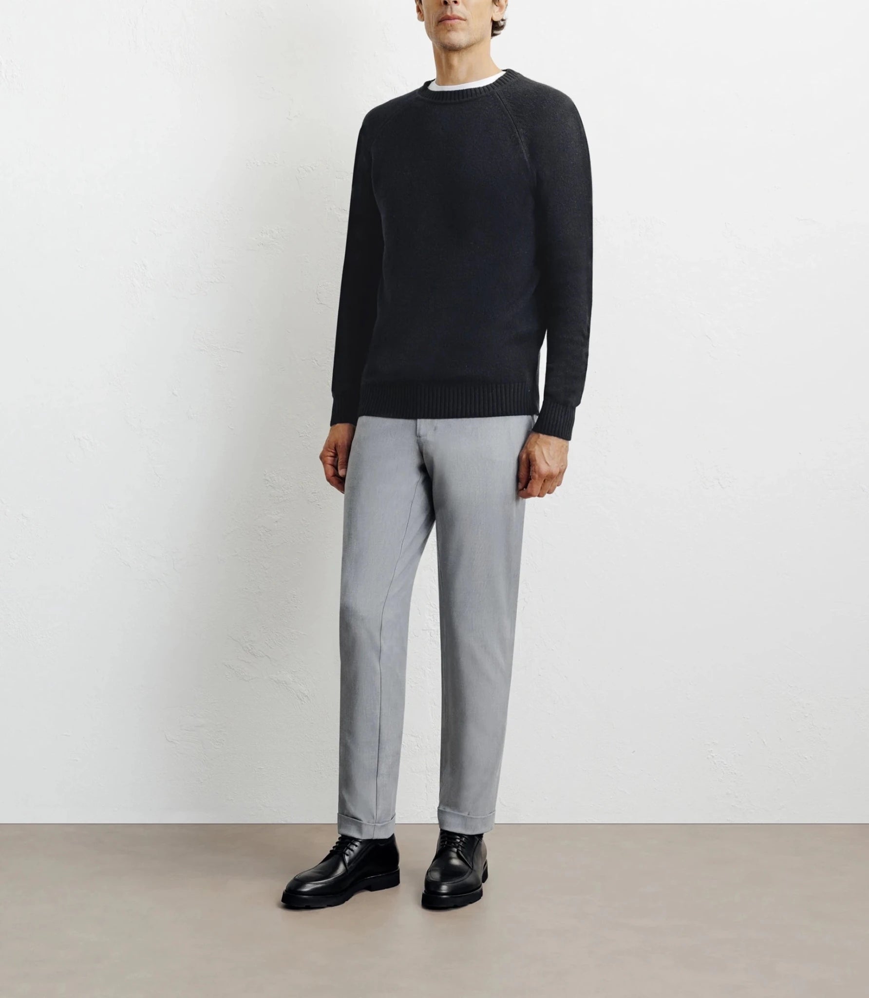 Black round-neck wool sweater