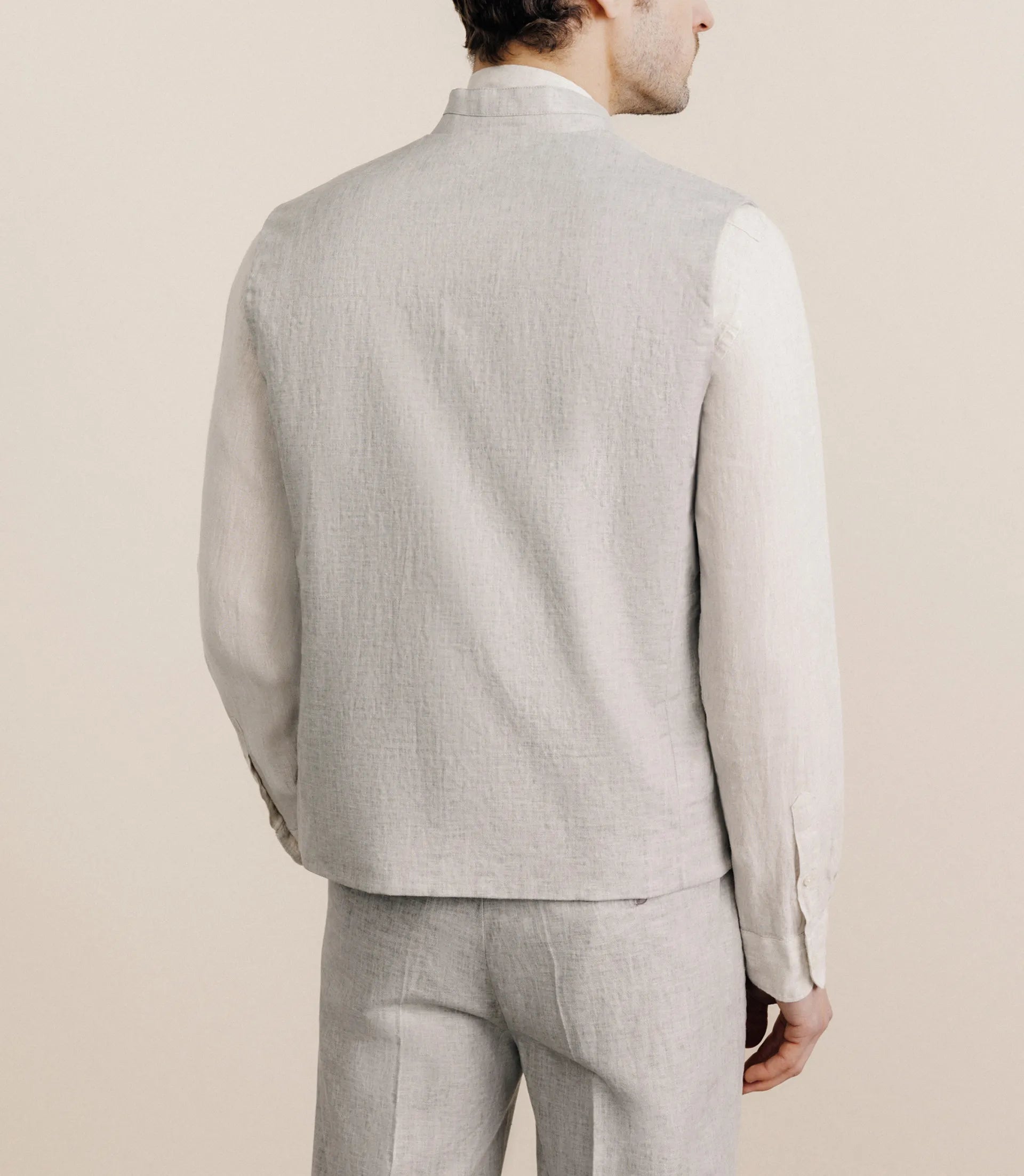 Grey sleeveless jacket