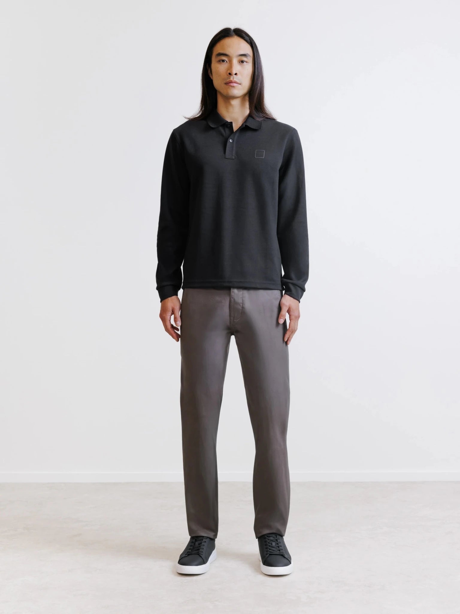 Polo manches longues col boutonné noir