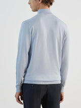 Light blue zip-neck jumper