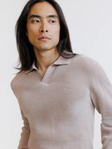 Beige open polo collar jumper with textured stitching