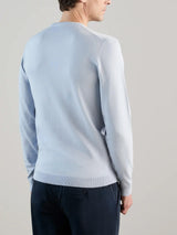 Light blue V-neck sweater