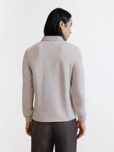 beige zip-up polo shirt
