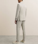 Costume with beige pockets