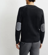 Round-neck sweater with black dots