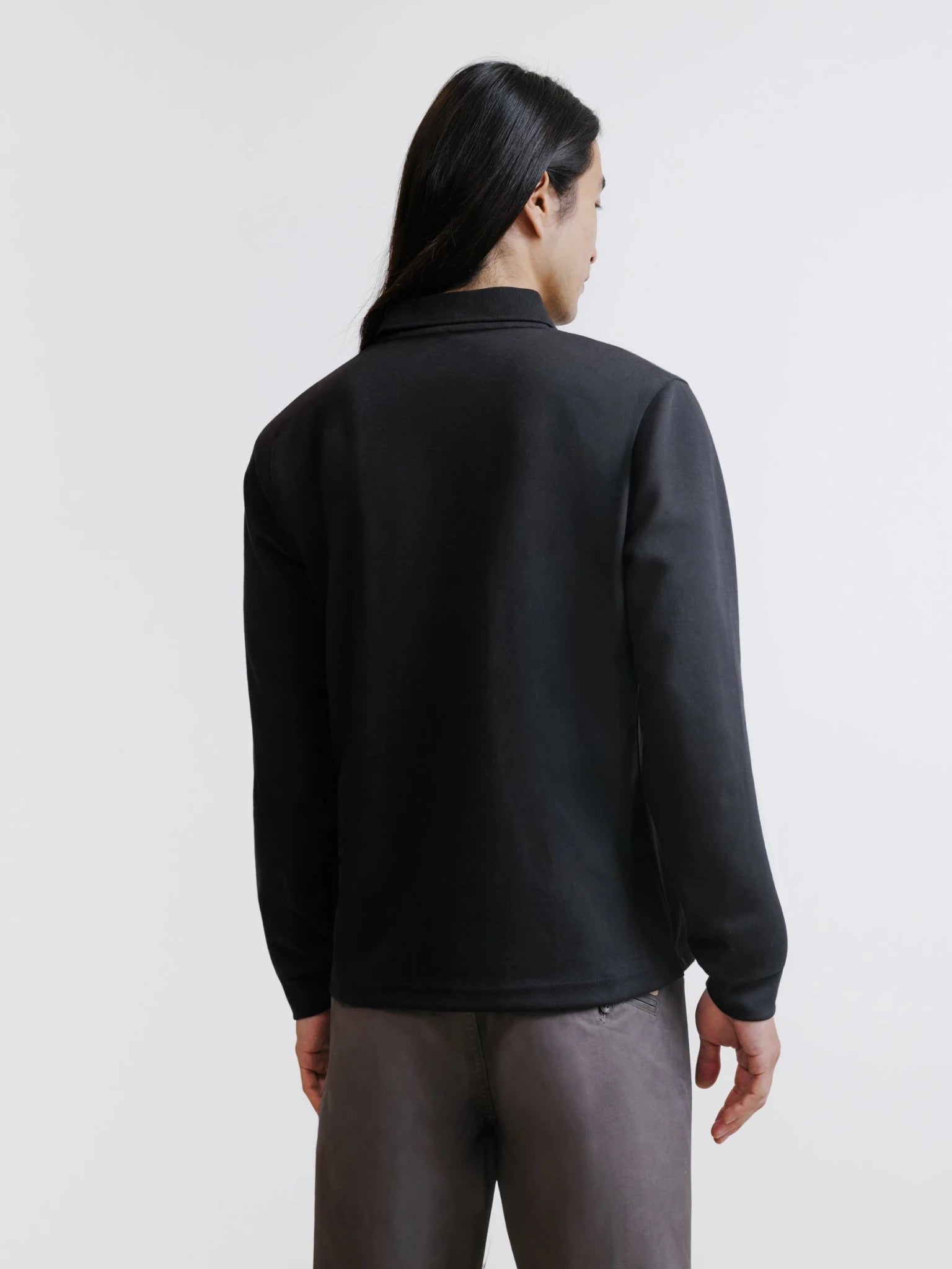 Polo manches longues col boutonné noir