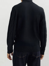 Pull col roulé torsadé noir
