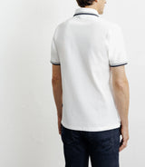 Polo piqué boutonné blanc