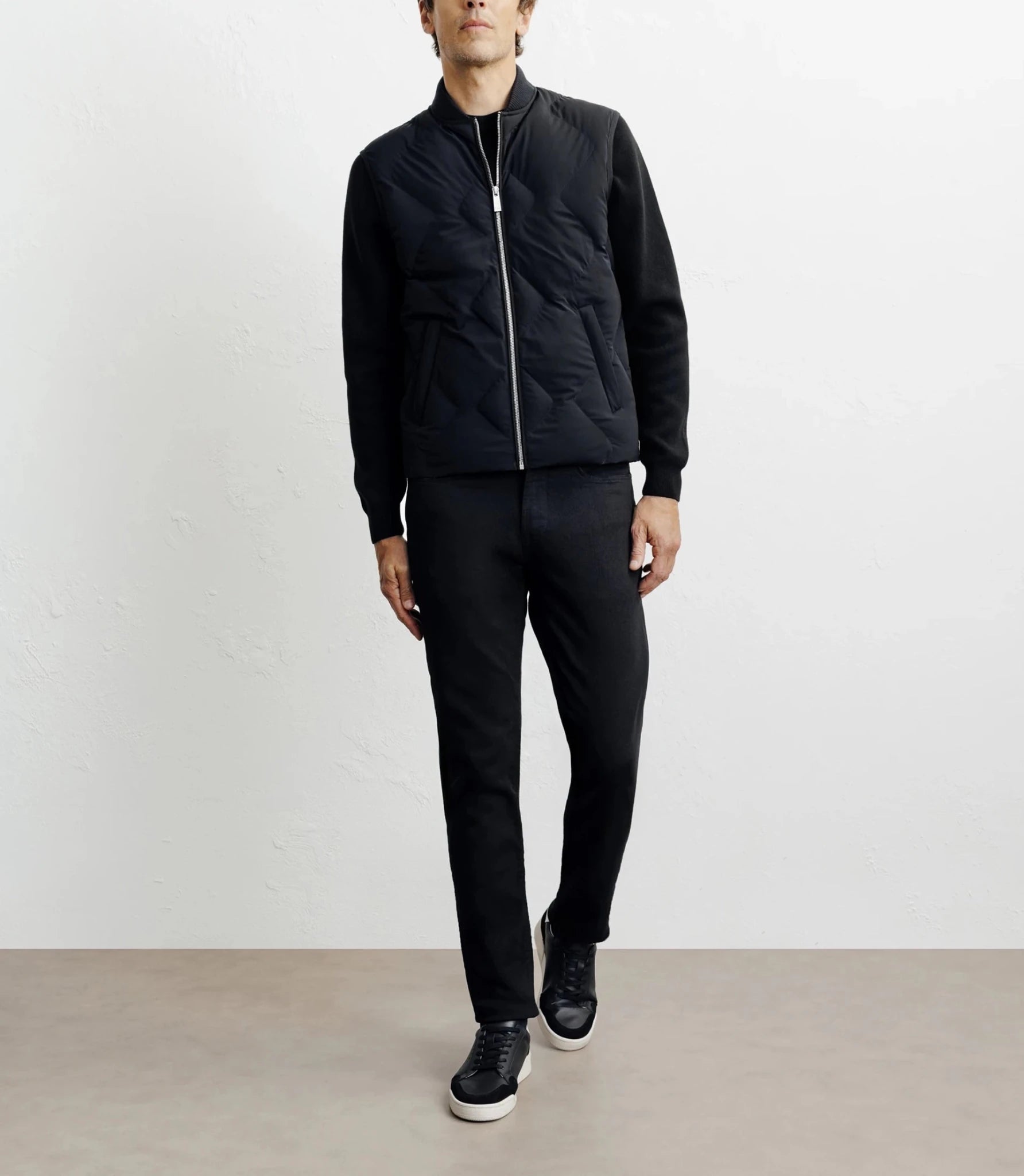 Sleeveless padded jacket, black