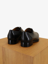 Black leather richelieu shoes