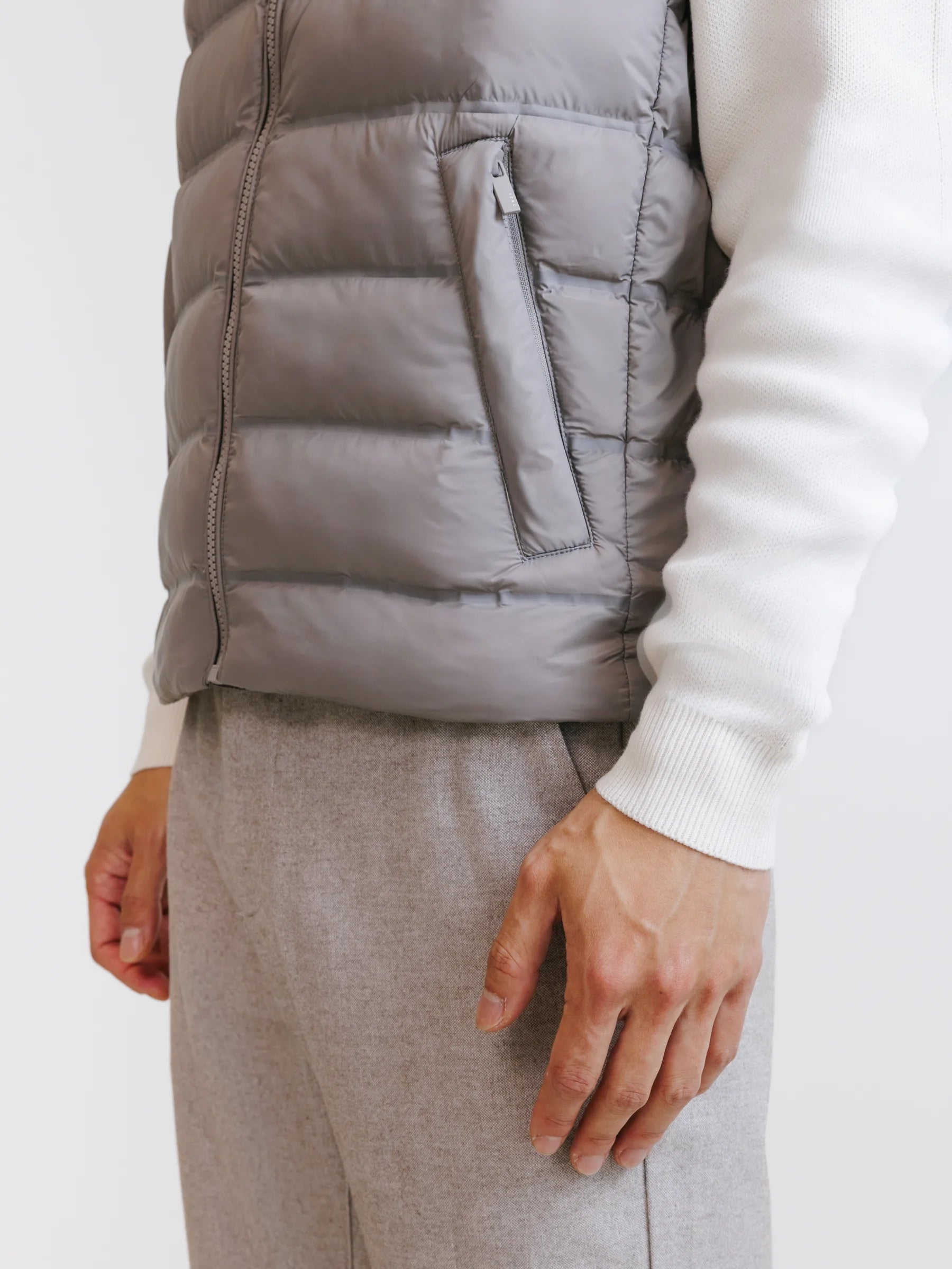 Taupe sleeveless puffer jacket