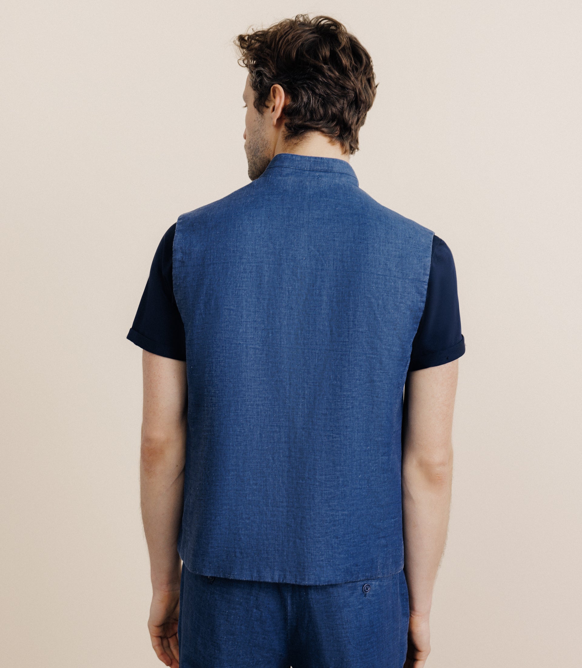 Indigo sleeveless jacket